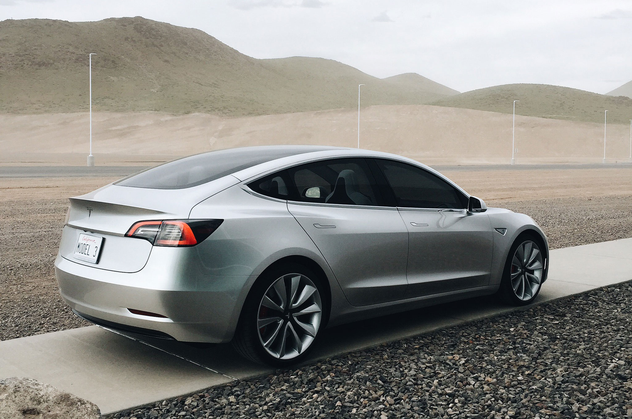 Tesla Model 3 Rear Side View Motor Trend En Español Tesla Model 3 Rear Side View
